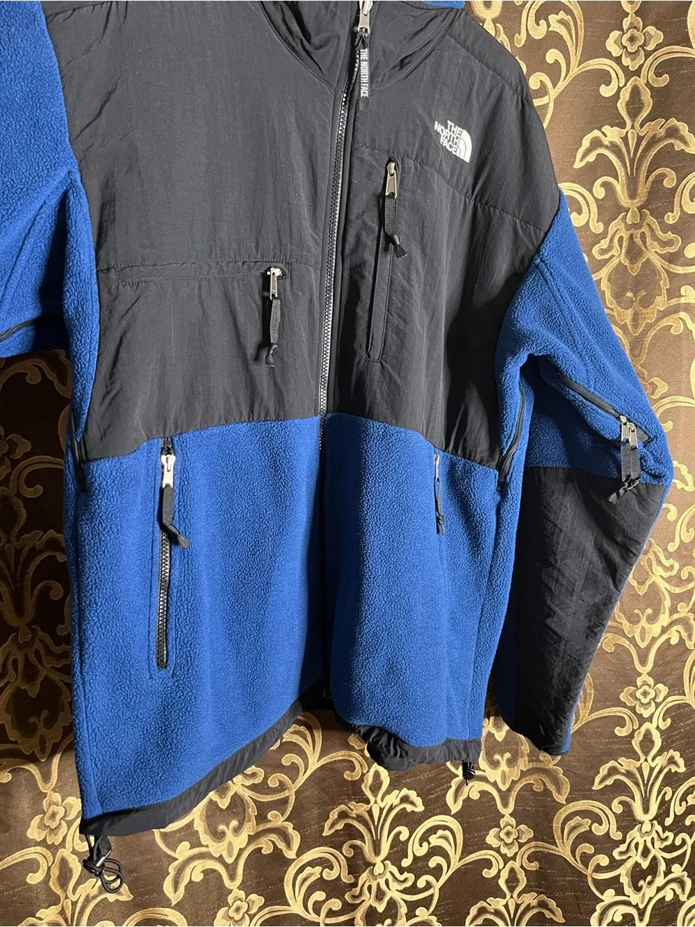 The North Face Men’s Black Denali Jacket with Blue Fleece Lining